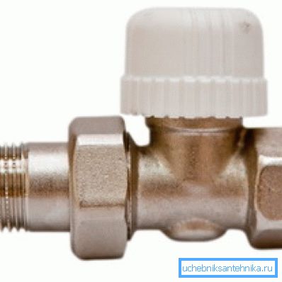 Questa è una valvola del radiatore sotto la testina termica. Questa è una valvola del radiatore sotto la testina termica.