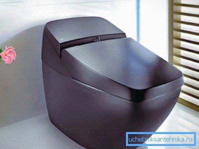 Una toilette marrone high-tech con una tinta viola si adatterà perfettamente a un design minimalista. Una toilette marrone high-tech con una tinta viola si adatterà perfettamente a un design minimalista.