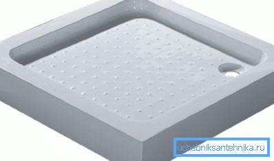 Su una foto - una piccola ciotola quadrata Su una foto - una piccola ciotola quadrata
