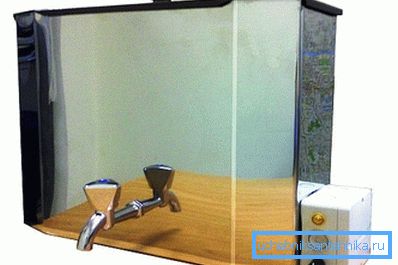 Nella foto - un lavabo a muro in acciaio con riscaldamento elettrico. Nella foto - un lavabo a muro in acciaio con riscaldamento elettrico.