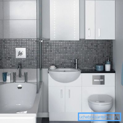 Lavandini per una toilette di piccole dimensioni con un paracarro dietro un water Lavandini per una toilette di piccole dimensioni con un paracarro dietro un water