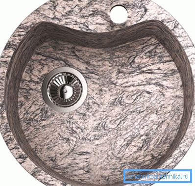Il lavello ad angolo circolare per la cucina di granito assume una disposizione sfalsata del miscelatore per la massima praticità Il lavello ad angolo circolare per la cucina di granito assume una disposizione sfalsata del miscelatore per la massima praticità